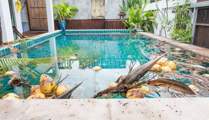 how to get dirt off the bottom of a pool